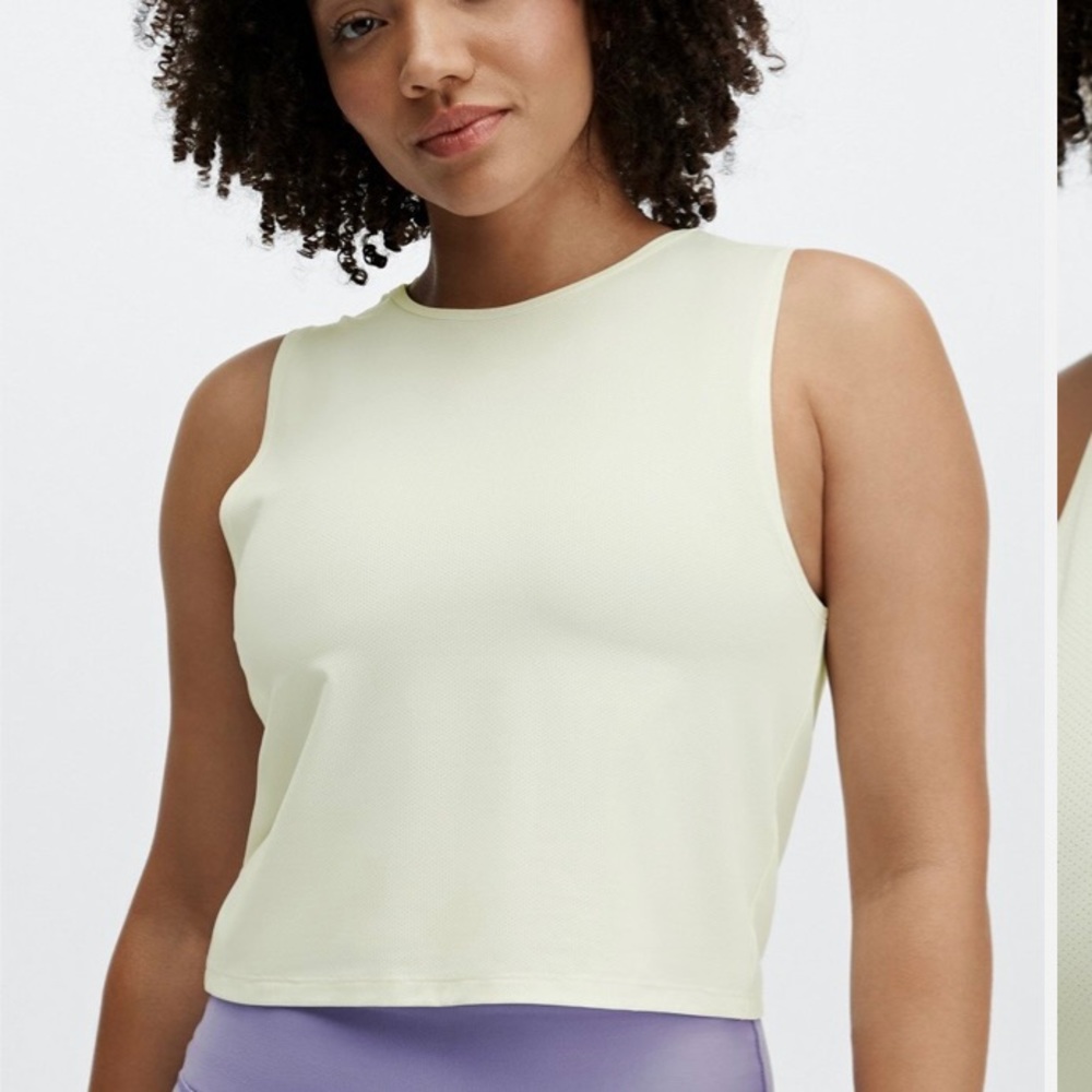 NWT light yellow muscle tank medium